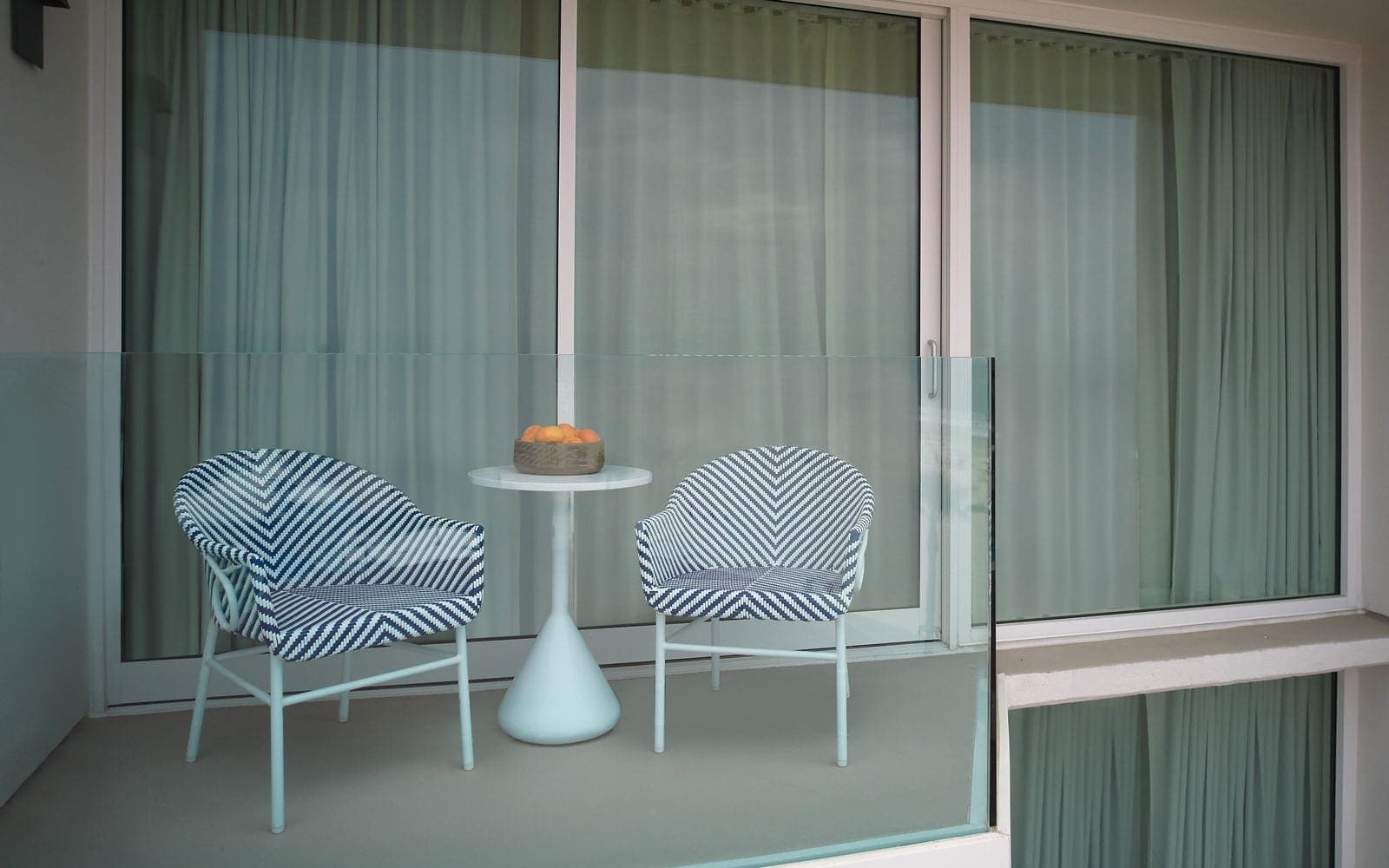 Ocean-view room with sliding glass doors to balcony at The Views, Hotel del Coronado