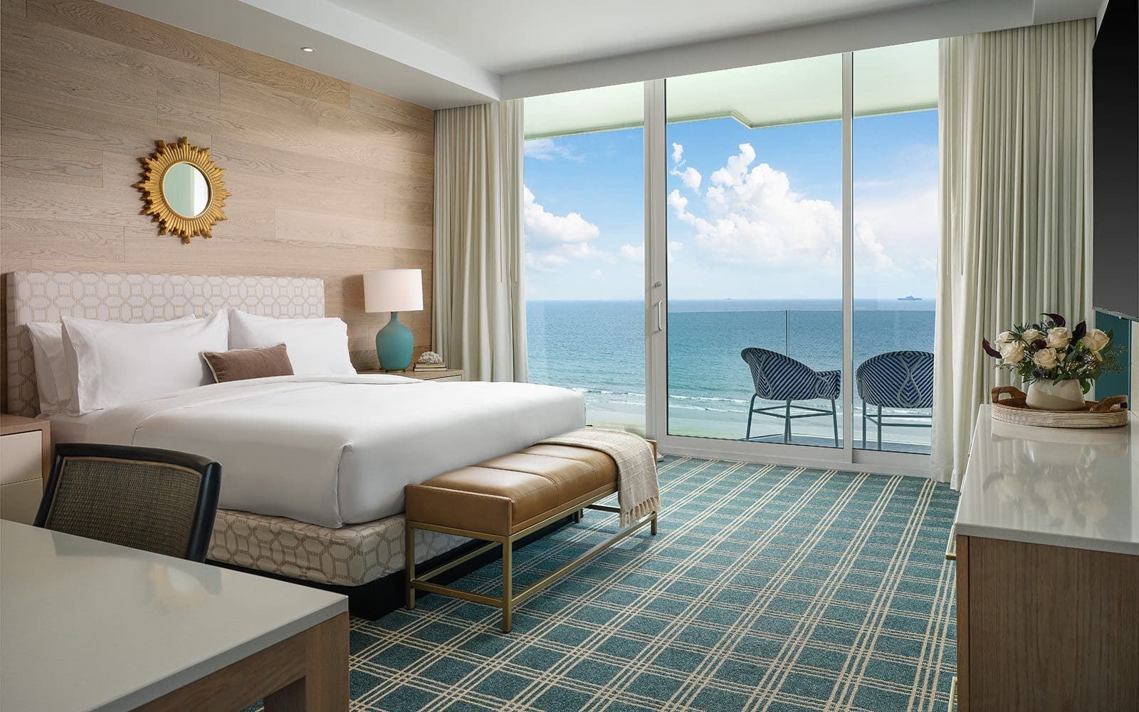Oceanfront King Suite bedroom with ocean-view balcony at Hotel del Coronado